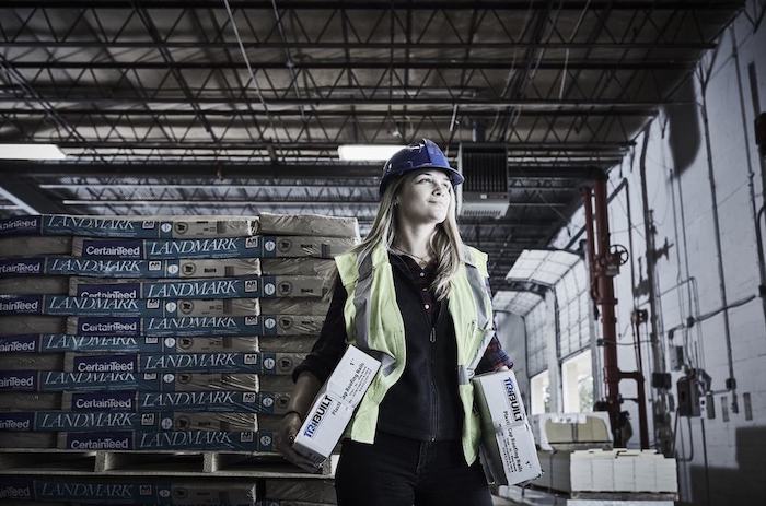 A happy Beacon employee in the warehouse